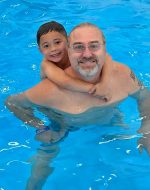 2022-10i - Swimming with EJ in hotel pool, Colorado